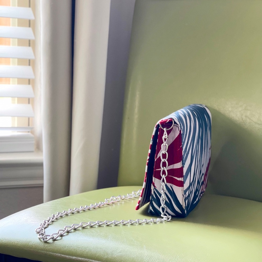 17 in silver chain bag. 9.75 in wide 6.5 in tall